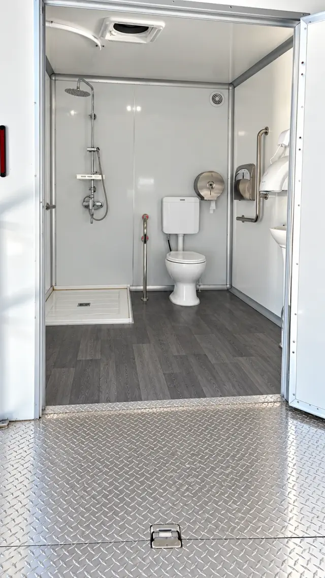 Shower-Restroom Combination Trailer (3 Stalls + 1 ADA) for rent from Workforce Housing New Hampshire